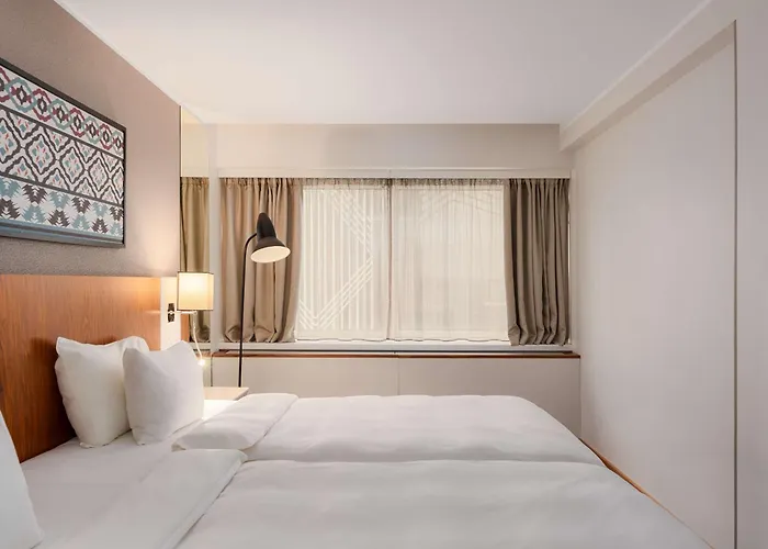 Radisson Blu Oluempia Готель